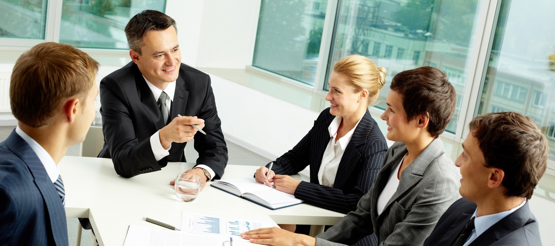 Family in front of new house